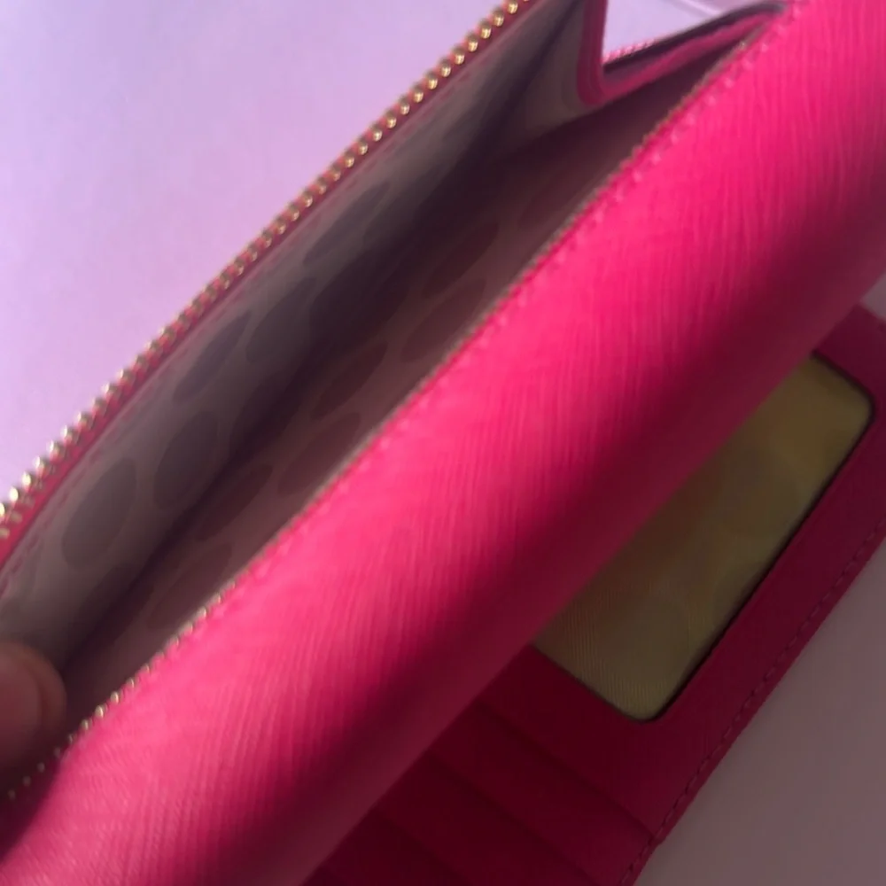 Kate Spade Pink Wallet Sleek Fold-Over Design (Inside plastic is stained)